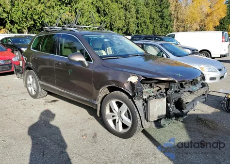 2012 Volkswagen Touareg V6 Tdi z USA, uszkodzony, nr VIN WVGEK9BPXCD012003